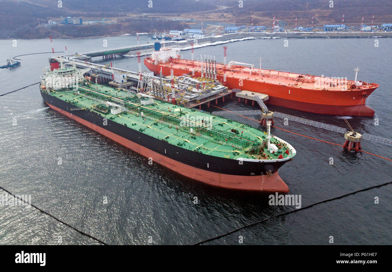 Crude oil tanker loading at terminal